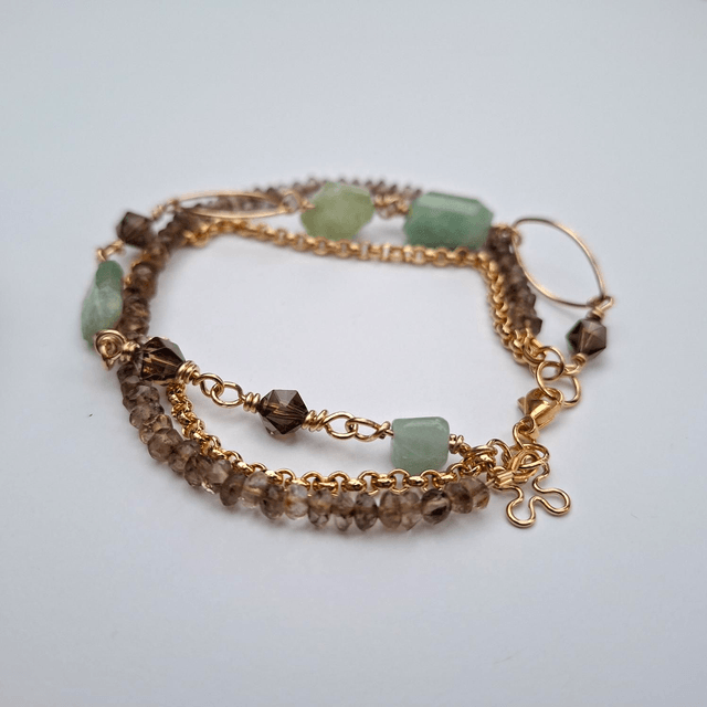 Aquamarijn met rookkwarts vergulde armband 